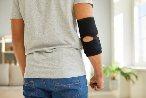 A man wearing a non-compression arm sleeve.