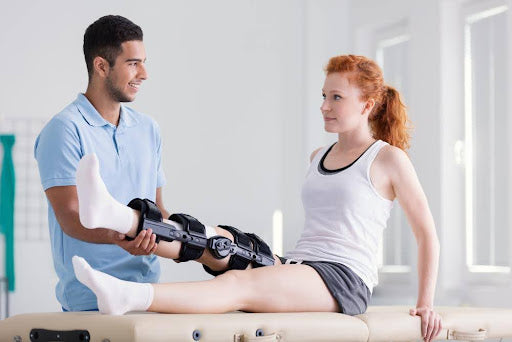 A woman wearing the best knee brace for ACL recovery.