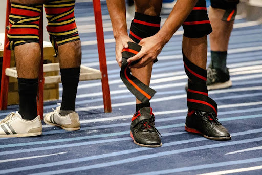 Powerlifter wearing knee wraps.
