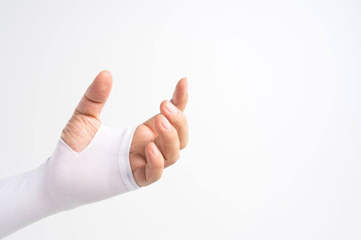 White wrist compression sleeve.