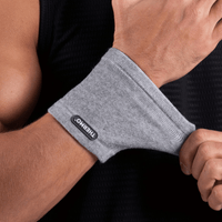 Thumbnail for slider2 : A man wearing a Thermo Wrist Sleeve for recovery